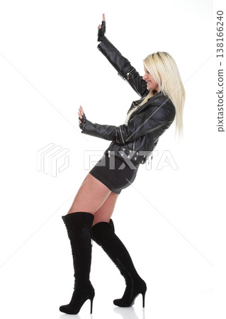 Portrait of a beautiful young female rock isolated Portrait of a beautiful young female rock isolated 138166240