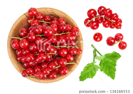 Red currant berries in a wooden bowl isolated on white background. Top view. Flat lay 138166553