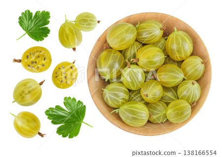 Green gooseberry in a wooden bowl isolated on white background . Top view. Flat lay. Green gooseberry in a wooden bowl isolated on white background . Top view. Flat lay. 138166554