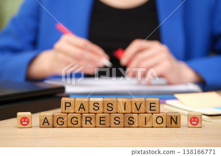 Exploring the intricate dance of communication through the concept of passive aggression in a modern workspace setting 138166771