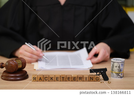 Justice is served as a judge deliberates on a serious case involving racketeering and law enforcement tools Justice is served as a judge deliberates on a serious case involving racketeering and law enforcement tools 138166811