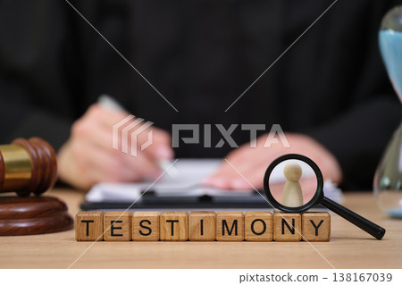 A courtroom setting where testimony is gathered and justice is served A courtroom setting where testimony is gathered and justice is served 138167039