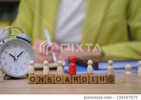 Creative onboarding process showcasing teamwork and time management in a modern office setting Creative onboarding process showcasing teamwork and time management in a modern office setting 138167075