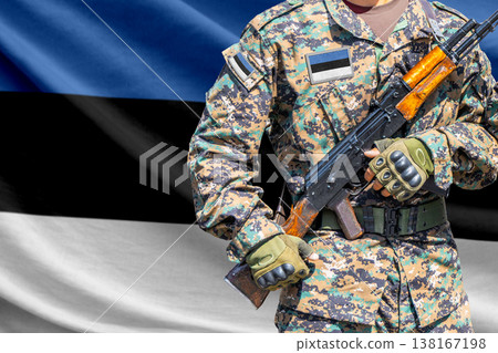 Estonia flag with soldier holding assault rifle Estonia flag with soldier holding assault rifle 138167198