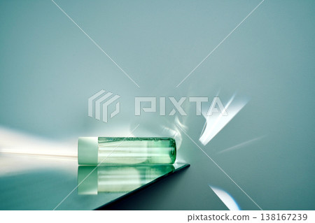 Cosmetic product in glass bottle with light refraction 138167239