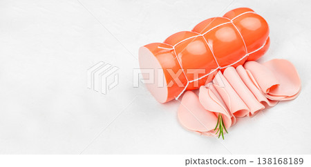 Boiled sausage and ham slices on white background, top view deli meat composition with copy space 138168189