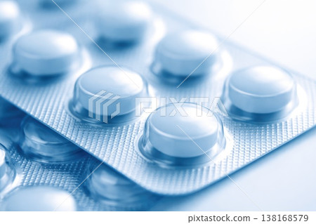 Close up of white medical pills in blister packaging pharmaceutical concept 138168579