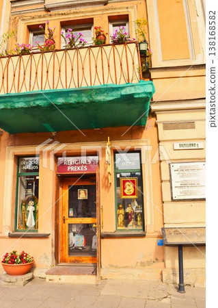 Yellow shops and flower balconies in Vilnius Old Town 138168582