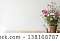 Cosmos flowers and white wall interior background material with natural light and copy space 138168787