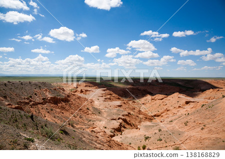 Flaming Cliffs rocks landscape, Mongolia. Gobi desert Flaming Cliffs rocks landscape, Mongolia. Gobi desert 138168829