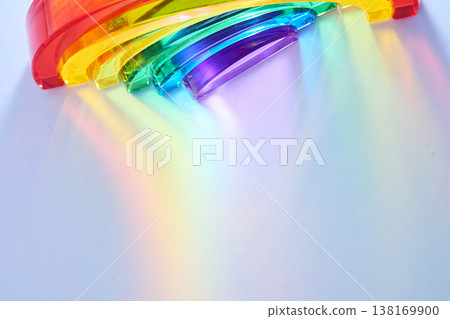 Rainbow spectrum light refracting through glass prism Rainbow spectrum light refracting through glass prism 138169900