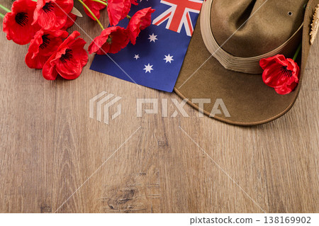 Anzac day remembrance with slouch hat, flag, and poppies 138169902