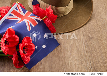 Australian flag, poppies, and slouch hat commemorating anzac day Australian flag, poppies, and slouch hat commemorating anzac day 138169905
