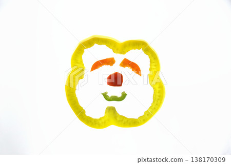 A character's face made from bell peppers and colored peppers. 138170309