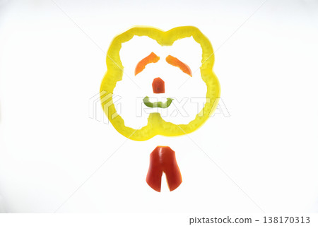 A character's face made from bell peppers and colored peppers. 138170313