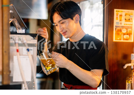 A man poured beer A man poured beer 138170937