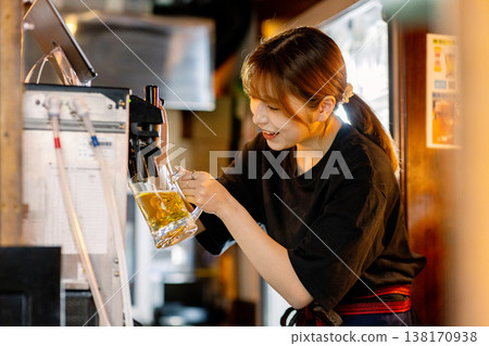 Woman working in a bar Woman working in a bar 138170938