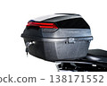 Black plastic motorcycle top case with keys and red reflector isolated on white background for travel and storage on motorbikes and scooters 138171552