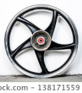 Black and silver motorcycle wheel rim cast alloy five spoke design isolated on white background for motorbike custom tuning and spare repair part 138171559