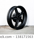 Black motorcycle wheel rim cast alloy five spoke design in perspective view isolated on white background for motorbike custom tuning and repair part 138171563