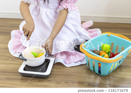 A girl (faceless, 5 years old, Japanese) playing house in a maid outfit. 138171679