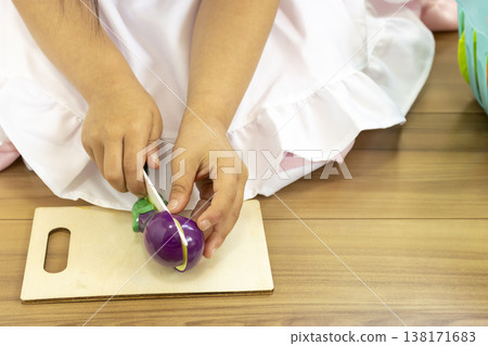 A girl (faceless, 5 years old, Japanese) playing house in a maid outfit. 138171683