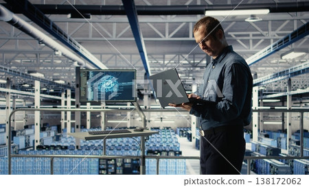Data center engineer adjusts system settings to improve AI rigs processing speed and efficiency. Server hub employee manages infrastructure to support artificial intelligence workloads, camera A 138172062
