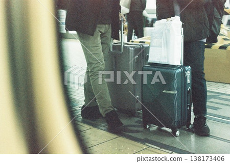 The feet of people who are traveling, seen from the train window The feet of people who are traveling, seen from the train window 138173406