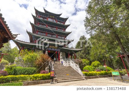 Lijiang, China - April 11, 2024 : Wangu Tower on Lion Hill in Lijiang old town, China on April 11, 2024. Lijiang, China - April 11, 2024 : Wangu Tower on Lion Hill in Lijiang old town, China on April 11, 2024. 138173488