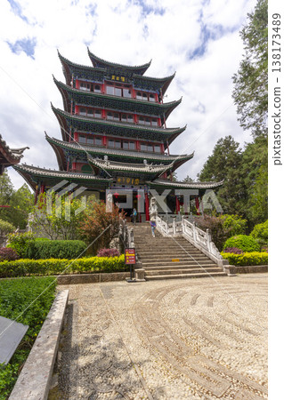 Lijiang, China - April 11, 2024 : Wangu Tower on Lion Hill in Lijiang old town, China on April 11, 2024. Lijiang, China - April 11, 2024 : Wangu Tower on Lion Hill in Lijiang old town, China on April 11, 2024. 138173489