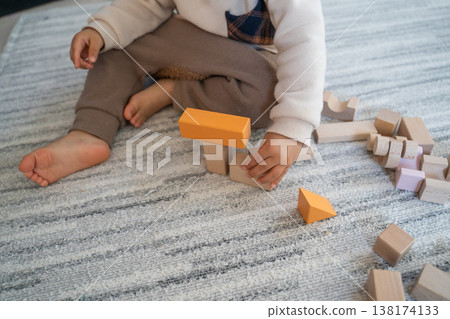 Baby playing with building blocks Baby playing with building blocks 138174133