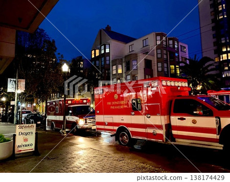A street scene with a red car 138174429