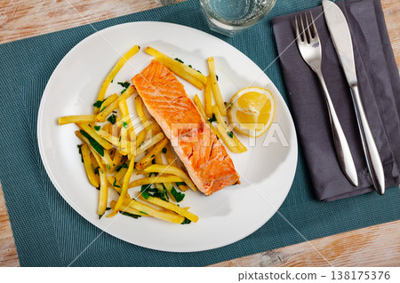 Salmon with potatoes is tasty dish in the kitchen Salmon with potatoes is tasty dish in the kitchen 138175376