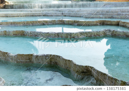 Carbonate travertines the natural pools during. Turkey 138175381