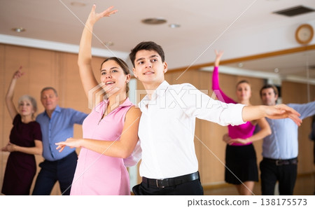 young woman with partner dance paso doble 138175573
