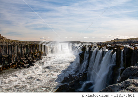 Selfoss, a type of water lily, flows down the Jökulsávfjöttrum River in northern Iceland, a Nordic island nation. Selfoss, a type of water lily, flows down the Jökulsávfjöttrum River in northern Iceland, a Nordic island nation. 138175601