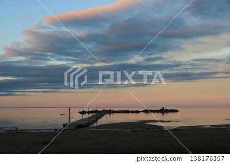 Quiet summer evening at the shore of Lake Vanern, Sweden. Quiet summer evening at the shore of Lake Vanern, Sweden. 138176397
