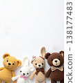 knitted bear dolls and animals in a flat lay with copy space for tex 138177483