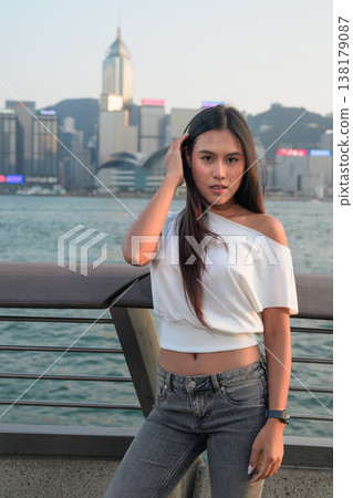 Smiling Thai Woman Tourist at Hong Kong Victoria Harbour Smiling Thai Woman Tourist at Hong Kong Victoria Harbour 138179087