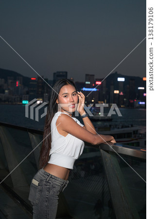 Thai Woman Tourist at Hong Kong Night Skyline 138179106