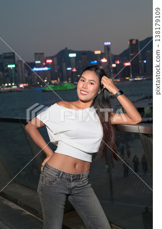 Thai Woman Tourist at Hong Kong Night Skyline Thai Woman Tourist at Hong Kong Night Skyline 138179109