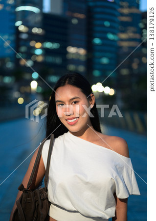 Smiling Thai Woman Tourist in Hong Kong at Night Smiling Thai Woman Tourist in Hong Kong at Night 138179126