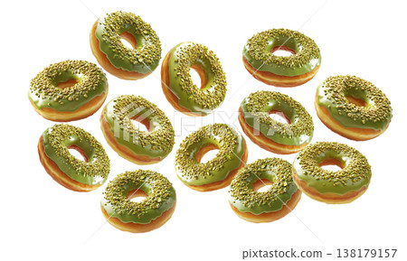 Multiple pistachio glazed donuts with crushed nuts isolated on a white background, concept of sweet bakery treats 138179157