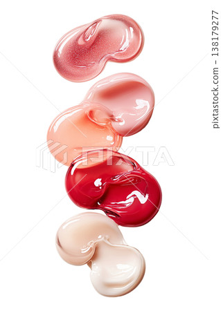 Glossy colorful skincare gel smears of lip gloss isolated on white background, symbolizing beauty and care 138179277