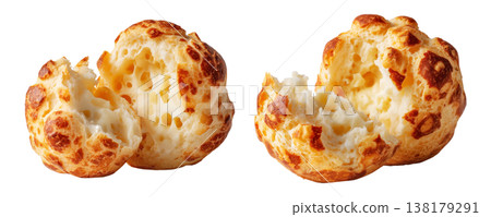 Small cheesy bread ball with golden crust and holes, isolated on white background, concept of Brazil Pao de Queijo food 138179291