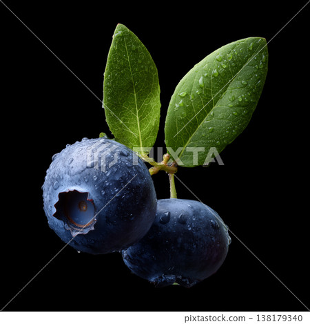 Closeup of blueberries or bilberry with leaves isolated on black background with clipping path, concept of freshness and nutrition Closeup of blueberries or bilberry with leaves isolated on black background with clipping path, concept of freshness and nutrition 138179340