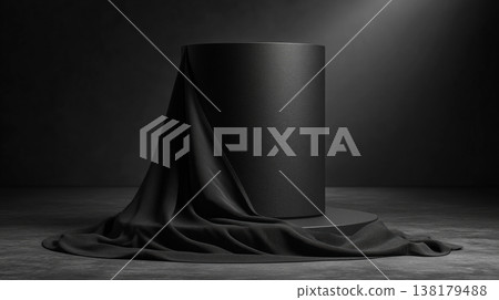 Black pedestal wrapped in flowing cloth, studio lighting, on a dark background, concept of luxury and elegance Black pedestal wrapped in flowing cloth, studio lighting, on a dark background, concept of luxury and elegance 138179488
