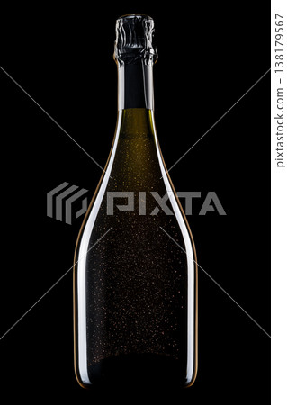 Champagne bottle with rising bubbles on black backdrop with clipping path, symbolizing celebration and elegance 138179567