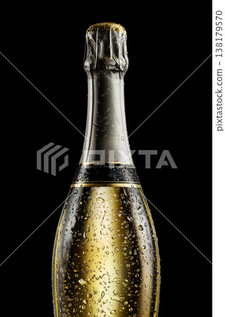 Champagne bottle with rising bubbles and silver foil on black backdrop with clipping path, symbolizing celebration and elegance Champagne bottle with rising bubbles and silver foil on black backdrop with clipping path, symbolizing celebration and elegance 138179570