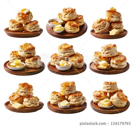 Buttermilk biscuits topped with syrup and butter, stacked on a wooden plate, isolated on white background, concept of breakfast 138179765